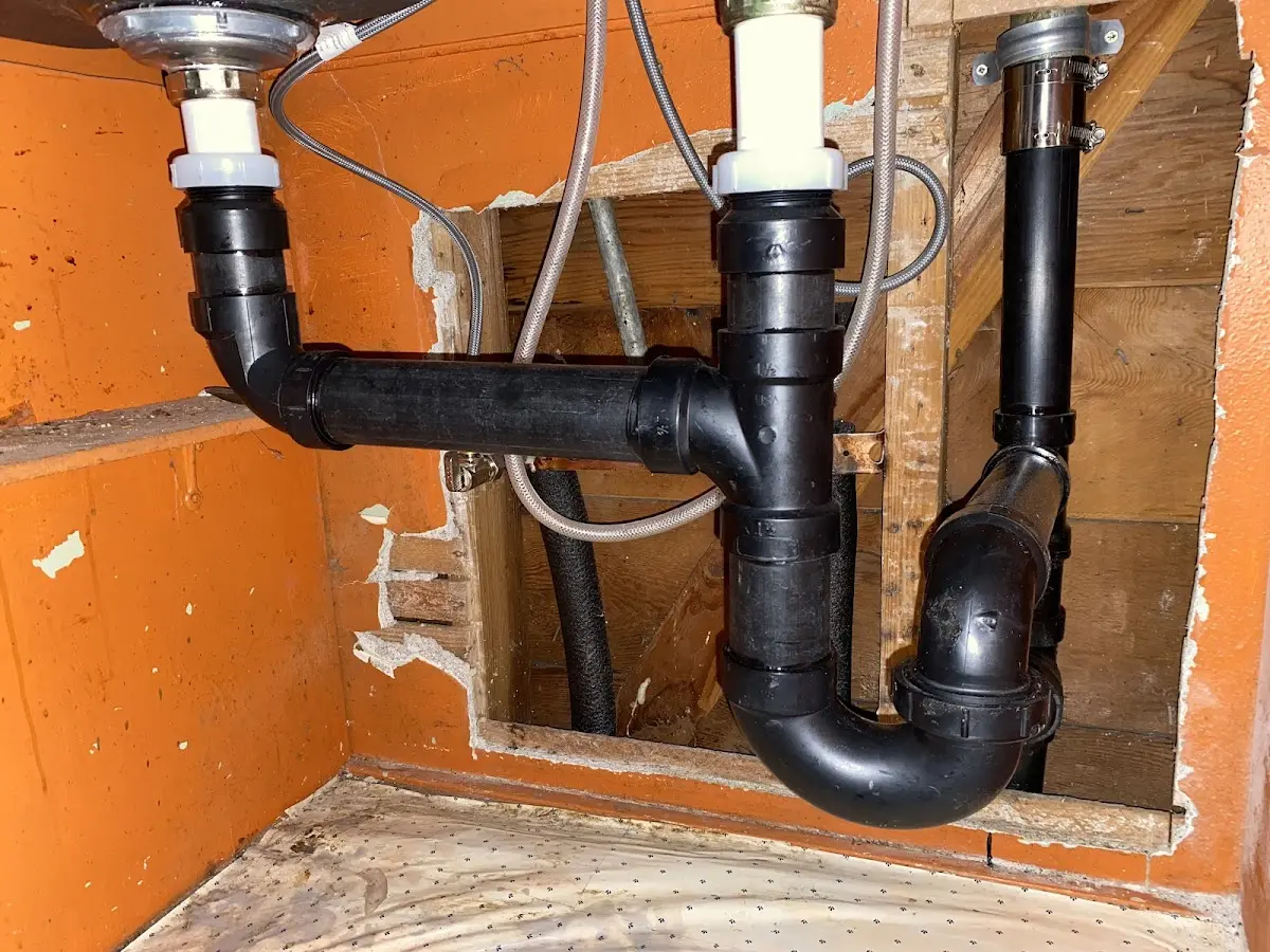 Professional Garbage Disposal Repair equipment and tools on the job in Blackstone